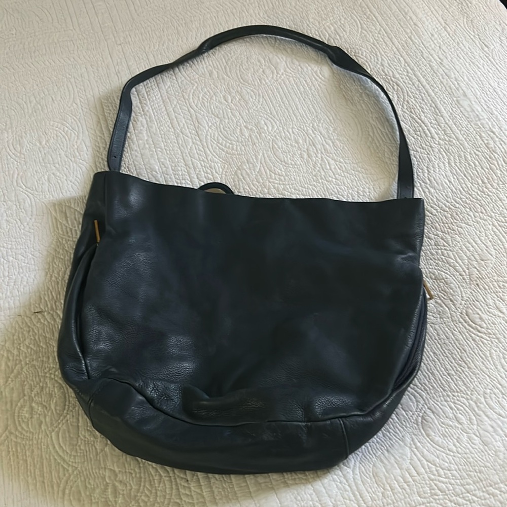 THE SAK dark navy leather shoulder strap.